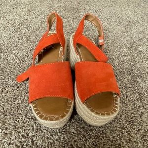 Orange wedge-platform shoe